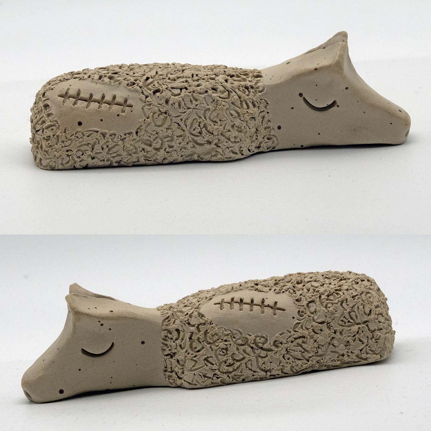 Vilodjur (nummer 28) "Jag har varit hos veterinären". – vilande skulptur i Lera.